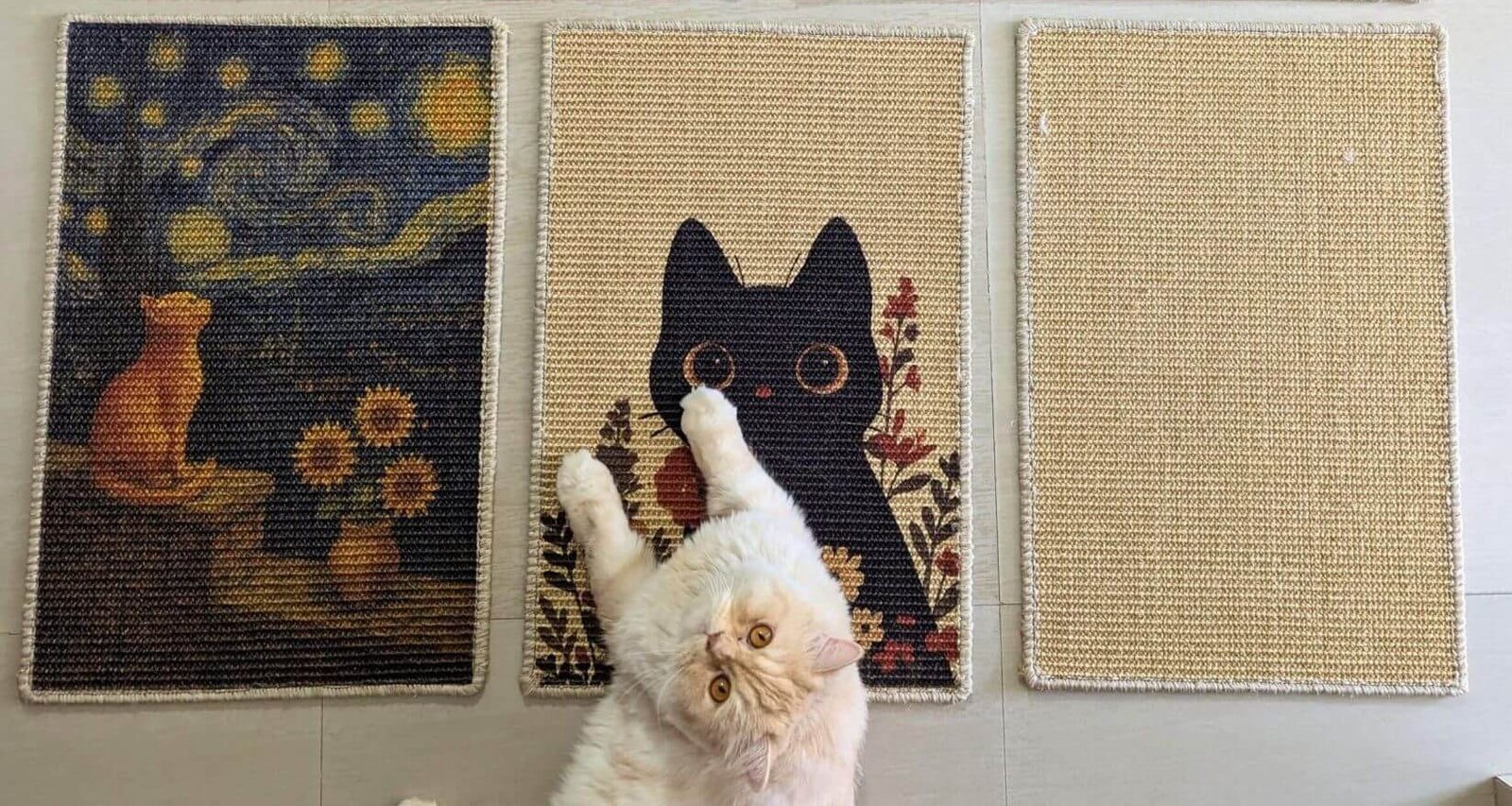 Cat interacting with a wall-mounted catnip toy shaped like a black cat with a flower.