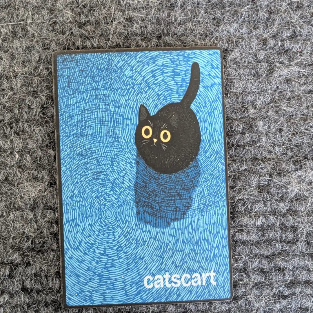 Black and Blue magnet on a grey carpet [Black and Blue (2×3 in)]